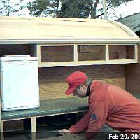  Making sure the face frame is perpendicular to the floor.