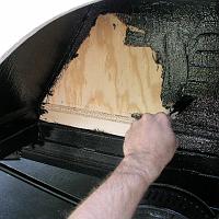  Paint the wheel wells with roofing tar.