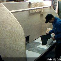  Finishing the floor in the galley.