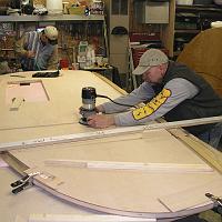  Cleaning up the grooves for the cross panels.