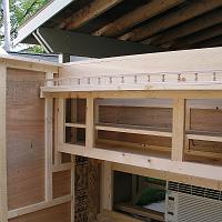  I like this rail on the inside. The shelf is a good place to store books, glasses, etc...